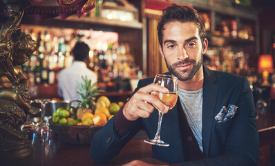 Poster - Portrait, wine and man in pub, happiness and stress relief with confidence or achievement drink. Face, person and customer with alcohol, glasses and comfort in restaurant, bar and small business