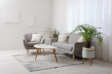 Wall Mural - Interior of modern light living room with comfortable sofa