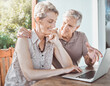 © CourtH/peopleimages.com - Smile, laptop and senior couple on terrace with travel planning, online booking or email review. Computer, old man and woman on patio for internet search for retirement holiday application on website