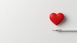 © franck - red heart on a white background