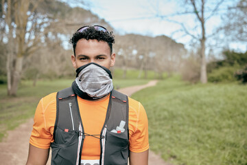 Canvas Print - Portrait, fitness and man outdoor for marathon, exercise or workout with mask in nature. Long distance runner, face and athlete at forest to prepare for race, competition or training for body health