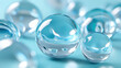 © tonstock - Part 1215689: Close-up of transparent glass orbs on a smooth blue background, creating a serene and futuristic abstract visual.