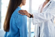 © Chanelle2000/peopleimages.com - Hand, shoulder or gynaecologist by woman for support, medical diagnosis or bad news in hospital. Comfort, consulting or doctor with sick patient for sympathy, infertility results or gynecology help