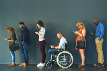 Wall Mural - Human resources, inclusive and job interview with row of people in studio on gray background for opportunity. Diversity, hiring or recruitment and man with disability in wheelchair for equality