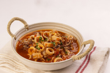 Wall Mural - Calamari Fra Diavolo is Italian Dish, Squid Ring With Spicy Tomato Sauce.