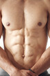 © Van Wyk/peopleimages.com - Man, body and six pack at gym for fitness with weightlifting for muscles, strength and health. Male person, bodybuilder and topless on exercising, training and workout for self care or wellness