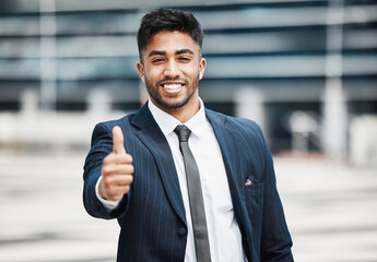 Canvas Print - Portrait, smile and businessman with thumbs up in city for success, support or quality work of urban planner. Face, like hand gesture and corporate expert with sign for review, excellence or good job