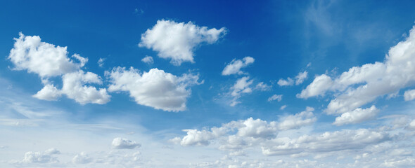 Wall Mural - the sky is blue with many clouds