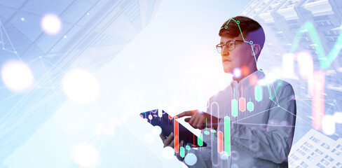 Poster - Businessman examines financial charts on a tablet with a cityscape backdrop. Double exposure highlights modern business and technology concepts