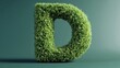 © Flowaiart - Green Grass Letter Sculpture Representing Nature and Organic Design
