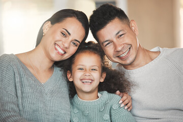 Wall Mural - Relax, portrait and child with parents on sofa in home for bonding, security and family time. Smile, happy and girl kid with mom and dad in living room for care, love or connection at house in Brazil