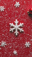 Wall Mural - White Snowflake on Red Background with Snowfall