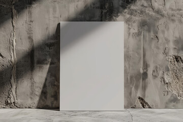 Poster - Blank Canvas Against a Textured Concrete Wall in Natural Light
