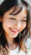 © Rysak - Close-up portrait of a young woman smiling