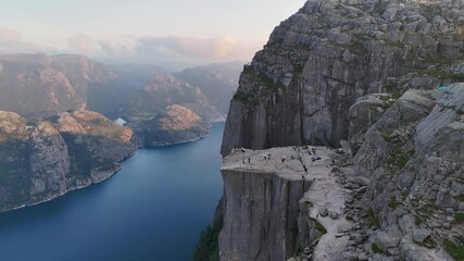 Wall Mural - Pulpit Rock or Preikestolen, Popular Hiking Destination, Norway. Orbiting Drone Shot. Amazing Aerial View in 4K.