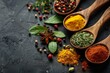 © Michael - Spoons filled with aromatic herbs and spices on dark background