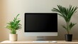 © Puttipong - A minimalist desk with a computer monitor, a keyboard, and a potted plant, creating a clean, productive workspace.