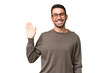 © luismolinero - Young handsome caucasian man over isolated background saluting with hand with happy expression