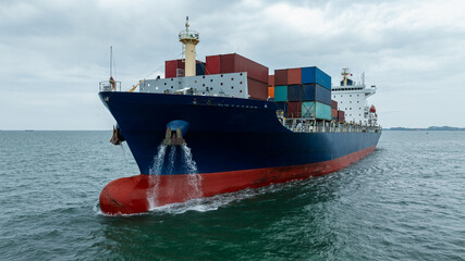 Wall Mural - logistic cargo container ship sailing in sea to import export goods and distributing products to dealer and consumers across worldwide, by container ship Transport business