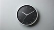 © Danicha - A minimalist analog clock with bold black hour and minute hands and clear white numerals on a plain gray background, evoking a sense of simplicity and timelessness.