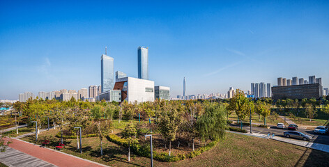 Sticker - Modern Cityscape with Park and Skyscrapers