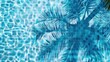 © yachyah - Palm Tree Shadow on Blue Tiled Pool