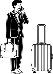 Businessman on the phone with luggage.