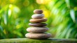 © ArtyKris99 - round smooth stones stacked according to Feng Shui - a relaxing atmosphere, tranquility, peace and quiet. background for yoga, presentation, spa treatments, relaxation.