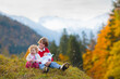 © famveldman - Family with kids hiking in the mountains