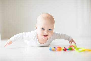 Wall Mural - Little baby on white floor