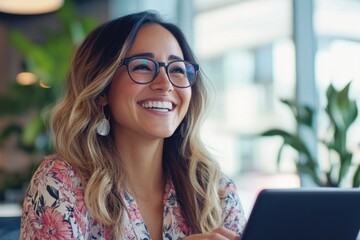 Woman with glasses using tablet