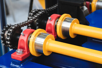 Aufkleber - Gear chain drive shaft in conveyor belt is on production line. Timing chain of car, tensioners in engine. Industrial roller chain, technology. Team work, business industrial concept