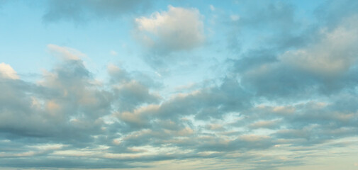 Wall Mural - beautiful tender sunrise sky with clouds. sky background.