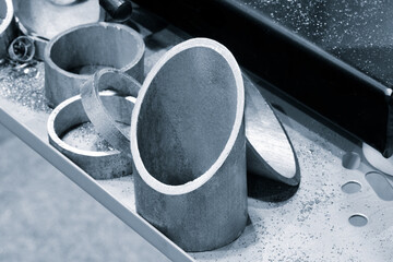 Poster - industrial metal pipes cut on metal table. industrial concept background