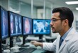© kotlyarn - A male doctor is focused on analyzing medical scans on multiple monitors in a modern laboratory setting.
