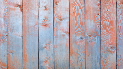 Poster - A wooden board with a blue and orange color scheme. The board is made of wood and has a rustic appearance. The blue and orange colors create a warm and inviting atmosphere, texture background