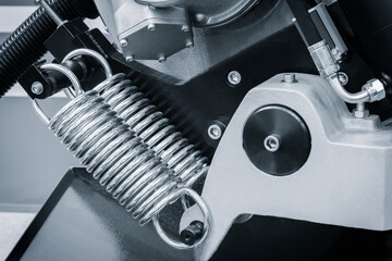 Aufkleber - A close up of a industrial mechanism with a spring attached to it, industrial concept background