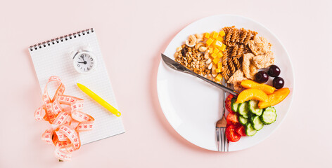 Set of healthy food for individual meal plan on plate on table top view web banner