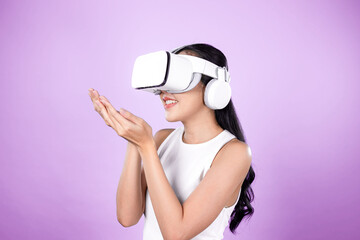 Wall Mural - Smart female standing with pink background wearing VR headset connecting metaverse, futuristic cyberspace community technology. Elegant woman excited seeing generated virtual scenery. Hallucination.