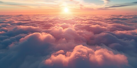 Poster - A peaceful aerial perspective of the sunrise over a wide stretch of billowy clouds