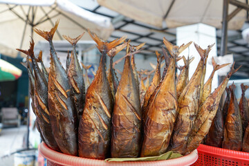 Wall Mural - Smoked and salted fish sold at the traditional fish market. Smoking and salting are natural preservation methods without chemicals. Tuban, East Java, Indonesia. 