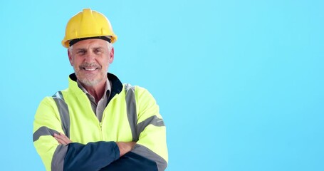 Wall Mural - Pointing, mockup and face of construction worker in studio with building option, menu or decision. Hardhat, smile and mature foreman with presentation gesture for list or choice by blue background.