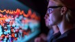 © Phichaphat - Woman in Glasses Studying Data Screen, Business Technology