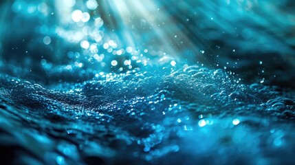 Fototapete - showcases a serene underwater scene featuring a blue light illuminating the ocean water through a la