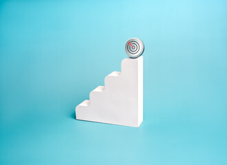 Poster - small 3d goal target icon on top white minimalist geometric stairway as growth graph steps, isolated