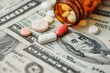 © Akarat Phasura - Various medicines on dollar bills , concept of Purchasing prescription drugs, Buying medicine , Generative AI