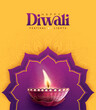 © Graphicstore - Happy Diwali festival with oil lamp, Rangoli decoration with Diya, Diwali holiday Background with rangoli, Diwali celebration greeting card,vector.