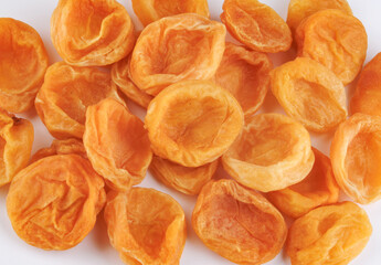 Wall Mural - Sugar dried apricots on a white background.