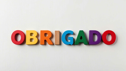 obrigado word colorful wooden letters on plain white background