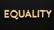 © Erlinda - equality word gold metallic shiny lettering on plain black background